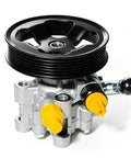 Hella Durable Power Steering Pump With Pulley Swaps In Clean For Toyota Corolla And Pontiac Vibe setup with yellow ports and black pulley.