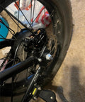 Four Piston Hydraulic Disc Brake Replacement Kit For X1S E Bike Upgrade, installed on rear wheel for safer stops