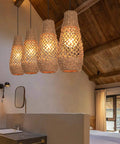 Boho Rattan Pendant Light Fixture over rustic living area, showcasing handwoven design, emitting Cozy Retro Island Glow ambiance.