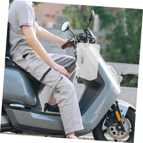 Tough As Nails Weatherproof Socket Box For E Bike Charger Shield mounted on scooter for outdoor use, durable white plastic housing.