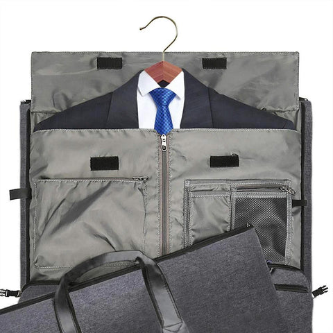 Convertible garment duffel bag open with suit on hanger for travel.
