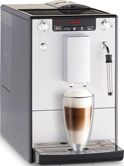 Game Changing Bean To Cup Automatic Coffee Maker With Creamy Frothed Milk And Slick Silver Black Design in action making cappuccino.