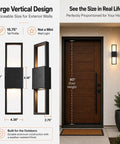 Modern Outdoor Wall Sconce 2 Pack, Up Down LED Light, 3000K, Hardwired displayed next to a door for size reference.