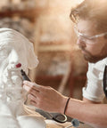 Artist using 300 Pack 1 Inch Abrasive Wheels Buffing Polishing Burr Set For Rotary Tools on marble sculpture, multi color