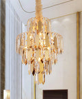 Lit Gold Finish Modern Crystal Chandelier, 5-Tier 7-Light Round Pendant Ceiling Light with adjustable chain in a living room setting