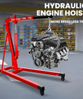 Heavy Duty 2 Ton Folding Hydraulic Engine Hoist with engine suspended in garage, showcasing sturdy design for 4000 pounds capacity.