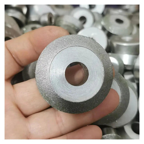 Universal 23-40mm Valve Seat Grinding Wheel Kit For Cars And Bikes Sturdy Diamond Repair Tools You Can Fix Minor Engine Mishaps Yourself With Ease. Diamond grinding wheel held in hand, close-up