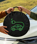 Heavy Duty EV Charger Tote Bag Made Tough With Ripstop Oxford Fabric Car Organizer Cord Hose Storage Cube being held outdoors.
