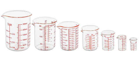 Seven Piece Glass Measuring Cup Set With Borosilicate Beaker Style Nesting Cups, Clear Markings From 1 Tsp To 8 Oz, Your Kitchen Go To For Baking, Cooking And Drink Prep, Durable Glass Easy To Read, glass measuring cups lined up
