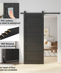32 By 80 Inch Sliding Barn Door Kit With Wave Pattern Door Panel, hardware included, installed in a room, matte black