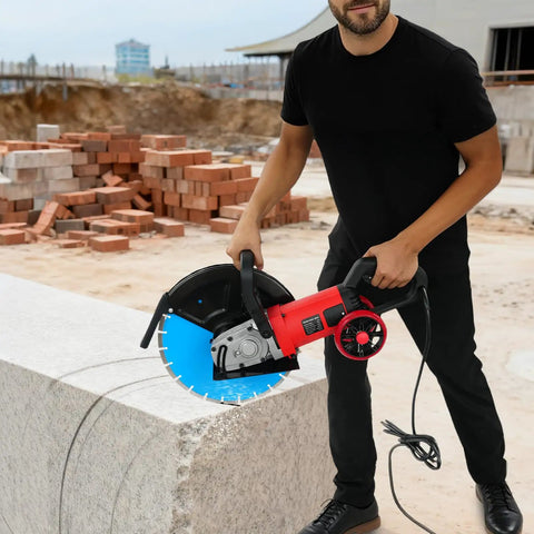 Heavy Duty Electric Concrete Cutter With 13 Inch Diamond Blade And Rolling Stand 4000W used for cutting granite block at construction site.