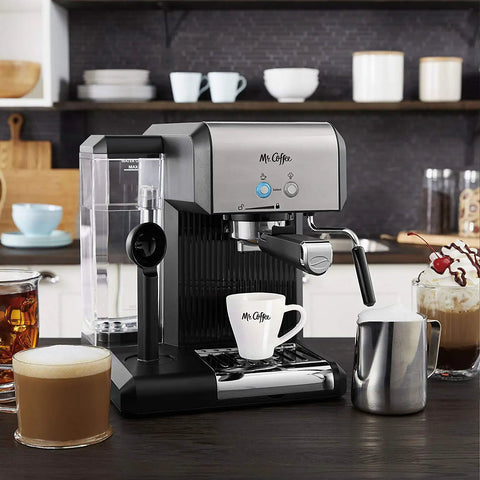 Your New Favorite Hustle Free Automatic Espresso And Cappuccino Maker Featuring Boss Level 15 Bar Pressure And Thermal Heating For Truly On Point Lattes In Silver And Black on kitchen countertop.