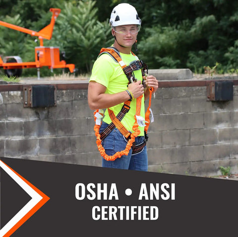 Worker wearing 4.5 to 6 ft double leg stretch lanyard with internal shock absorber and three steel snap hooks, ANSI and OSHA certified.
