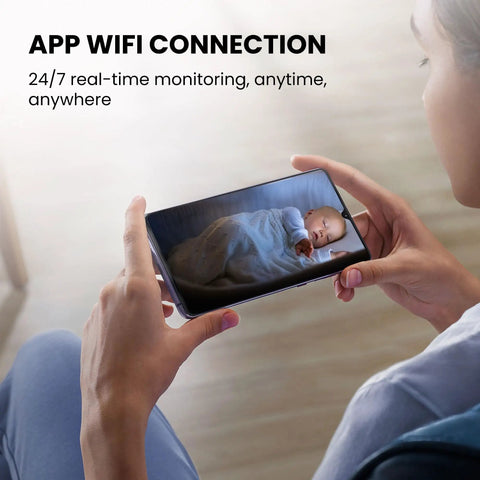 Person viewing video feed of sleeping baby on smartphone using 4K Ultra Clear Wireless Indoor Security Camera With 100 Day Battery Life.