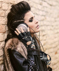 Womens Dope Edgy Punk Fingerless Leather Gloves Featuring Chill Ride Ready PU Half Finger Design With Grippy Wrist Wrap For Motoring Night Rides And Casual Hangout Wear worn by a woman listening to music.