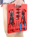 Hand carrying Beefed-Up Heavy Duty 2 Piece 10 Inch Multi Angle Internal And External Circlip Pliers Set with accessories in red case.