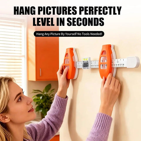 Professional 3 In 1 Picture Hanging Tool And Spirit Level Features Precision Measuring Ruler With Magnetic Nail Starter For No Sweat Wall Art Installation Diy Home Decor Game Changer in use on wall.