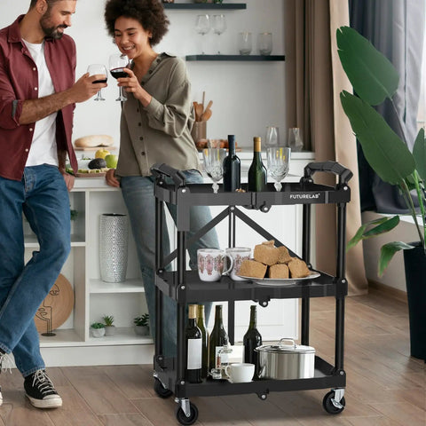 Portable Folding Service Cart With Three Tiers, 330 Lbs Capacity, Rolling Utility Cart On Wheels in home setting