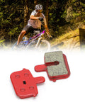 Mountain biker on trail with Eight Pack SemiMetallic Disc Brake Pads For Mountain And Electric Bikes for smooth stops