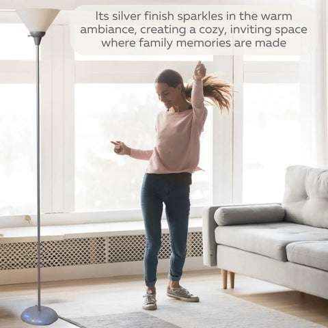 Mary Torchiere Floor Lamp With Opal White Cone Shade For A Warm Cozy Vibe And Glare Free Light in a modern living room setting
