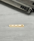 Hidden Pivot Door Hinges With Sleek Gold Finish, 8 Piece Copper Set on gray surface, close-up of hinge component