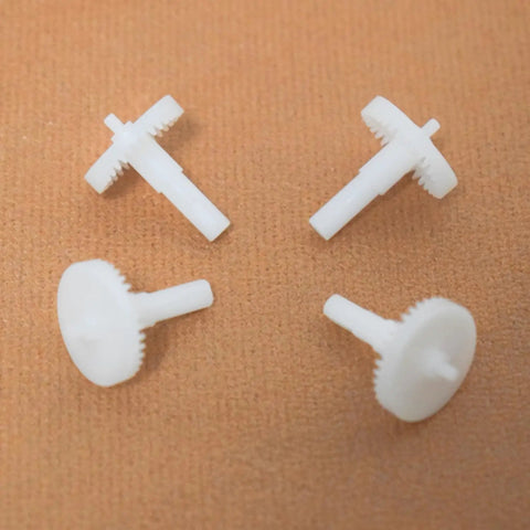36 Tooth Large Gear And 7 Tooth Pinion Gear Set for Four Axis RC Quadcopters on a textured surface