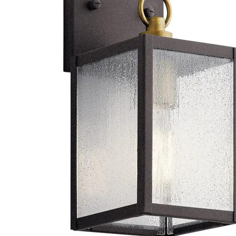 Lahden 16.75 Inch One Light Outdoor Wall Light with clear seeded glass and weathered zinc finish, showing close-up of glass texture.