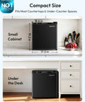 Compact One Point One Cubic Foot Upright Mini Freezer With Reversible Door And Adjustable Feet Hella Efficient Black Cold Storage in kitchen.