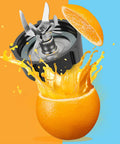 Blender blade from Six Point Fusion Blender Blade Replacement Kit With Jar Base cutting through orange with juice splash.