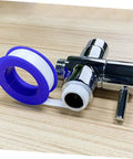 30 Pack High Temp PTFE Plumber Tape That Seals Leaks Like A Boss For Everyday DIY Home Plumbing Leaks And Airtight Seals Non Flammable Tape For Faucets And Pipe Fittings next to a metal faucet.