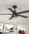 Breezary 52" Farmhouse Ceiling Fans with Lights and Remote, Industrial Ceiling Fan Cage Fandelier, mounted in a modern living room.