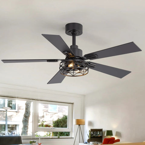 Breezary 52" Farmhouse Ceiling Fans with Lights and Remote, Industrial Ceiling Fan Cage Fandelier, mounted in a modern living room.