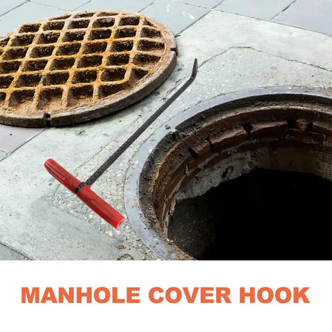 Rock Solid T Shaped Manhole Cover Lifter Hook Forged From Reinforced Steel Rod With A No Slip Grip For Reaching Down Into Deep Sewers And Yanking Open Heavy Roller Doors next to a manhole.