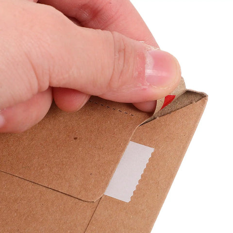 A4 Self Sealing Kraft Brown Envelopes Pack Of 30 Thickened Flat Cardboard Mailers showing secure peel-and-seal flap being opened