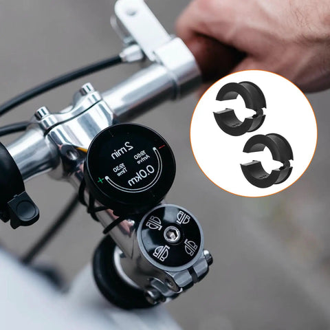 Close-up of bike handlebar with 16 Pack Bike Handlebar Gasket Shims Kit Converts 22.2 To 31.8 Mm And 25.4 To 31.8 Mm adapters.