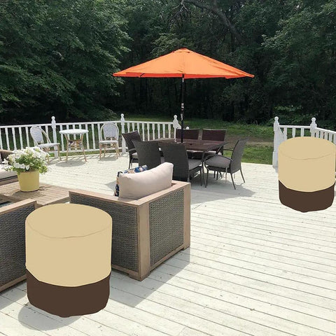 Outdoor patio with tables covered by Beige Waterproof 420D Polyester covers, showcasing Outdoor Patio Bar Table Cover For Round 21 Inch Diameter And 23 Inch High Fits Keter 7.5 Gallon Cool Bar End Tables Beige Waterproof 420D Polyester With Rainproof Backing For Small Outdoor Side Tables in use.