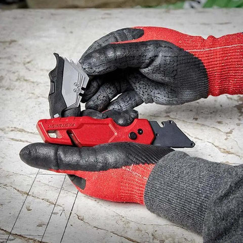 Hands holding Compatible With Milwaukee Fastback Utility Knife Model 48 22 1502, red handle, folding box cutter, blade storage.