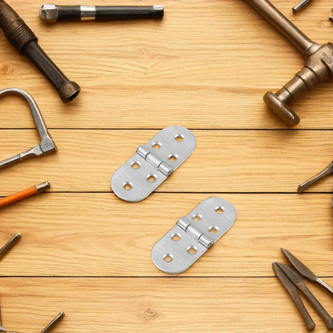 Beefy Stainless Steel Folding Table Hinge 180 Degree Swing 4 Pack on wooden background with tools, round edges visible.