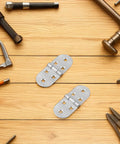 Stainless Steel Butler Tray Hinges 4 Pack For Computer Desk With Smooth Quiet Operation on a wooden surface with tools