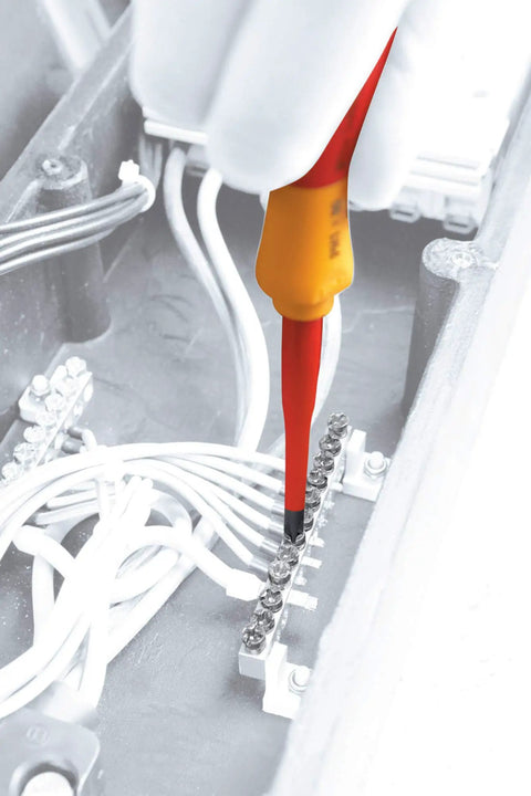 Using Insulated SlimLine Interchangeable Pro-Grade Screwdriver Set in electrical panel, 15-piece, 1000 Volt Rated, Slim Blade Design.
