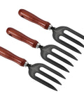 10.6 Inch Three Tine Hand Gardening Fork Set Of Three For Weeding Transplanting Loosening Soil And Planting Durable Carbon Steel Thickened Hardened Digging Pitch Fork For Backyard Farm Grey, showing a trio of forks with wooden handles.