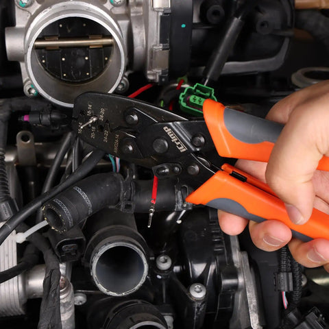 Hand using Open Barrel Terminal Crimp Tool Five Cavities For 24 To 14 AWG Non Insulated on automotive wiring