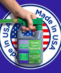 Heavy Duty Liquid Lawn Fertilizer With Iron And Nitrogen with hose end sprayer, label reading 'Simple Lawn Solutions,' made in USA
