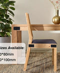 Heavy Duty Mending Plates And Black Corner Braces Built Tough As Nails For Furniture Repairs Or Woodworking Fixes Rust Resistant Coating Comes In 4 Pack With Screws, displayed on a wooden chair and table.