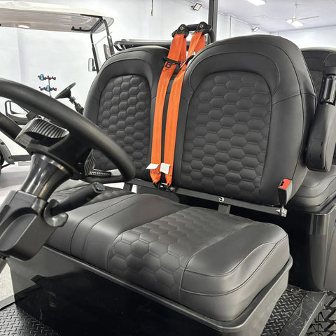 Interior view of premium stitched seats in Top Tier Electric Golf Cart 4 Seater Loaded Up With 48V Power Motor, featuring safety straps.
