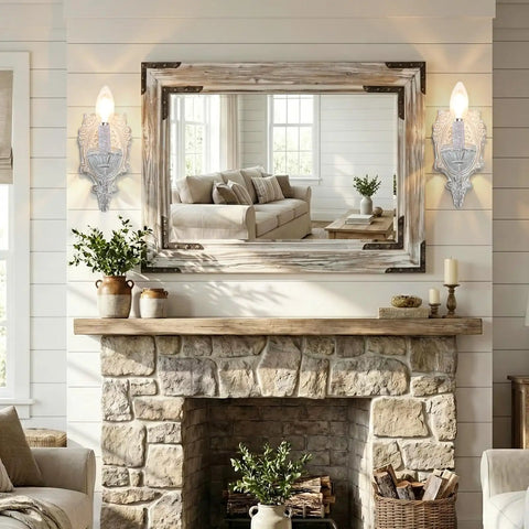 ZIRALIO Farmhouse Vintage Wall Sconce for Bedroom, 2-Pack, displayed beside a large mirror over a rustic stone fireplace.