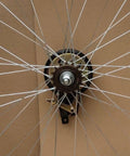 Slick Single Speed Rear Wheel Rim With Heavy Duty Aluminum Hub And Plug In Brake Assembly For No Sweat Bike Repair And Rock Solid Stopping Power Built To Roll All Week Long, view of hub and spokes.