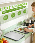 Front view of ANYZONE 17x11 inch stainless steel cutting board, double-sided with juice grooves