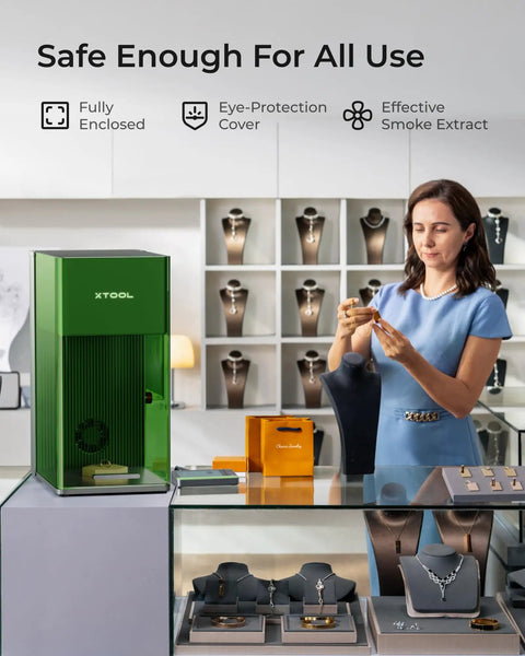 F1 Ultra 20W Fiber And Diode Dual Laser Engraver in a store setting with jewelry displays and a woman examining a necklace
