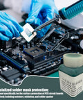 Technician applying Solder Mask Ink For Circuit Boards Green Epoxy, UV Curing Solder Protection Paste to PCB in electronics lab.